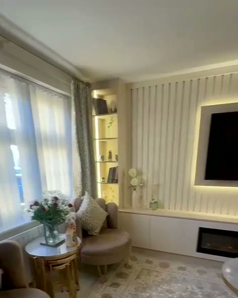 Fluted wall with LED-framed TV and lit shelving, Derby, built by WK Home Interiors